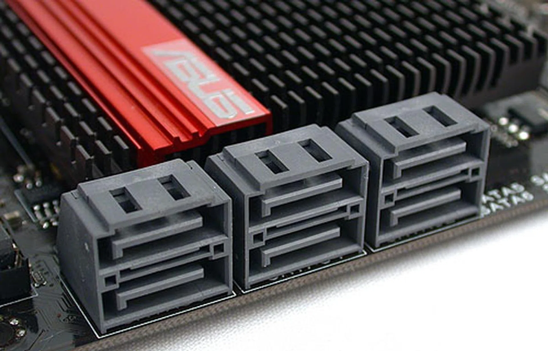 These are the six SATA 3.0Gbps ports provided by the Intel P55 Express chipset, aligned outwards at the edge of the board.