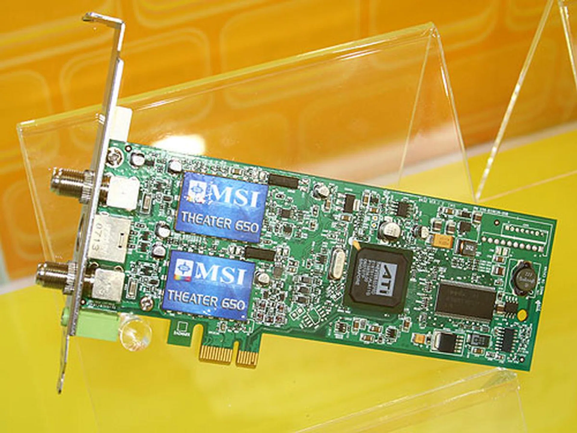  The MSI Theater 650PRO is a TV card that features two tuners for ATSC HDTV and analog TV (NTSC) which allows one to watch these two channels together. It has a powerful 12-bit video engine and motion adaptive 3D comb filter as well as a built-in hardware MPEG compression engine. Other features include radio receiver, addition AV/S-video input for other video sources and a fast PCIe x1 interface.  