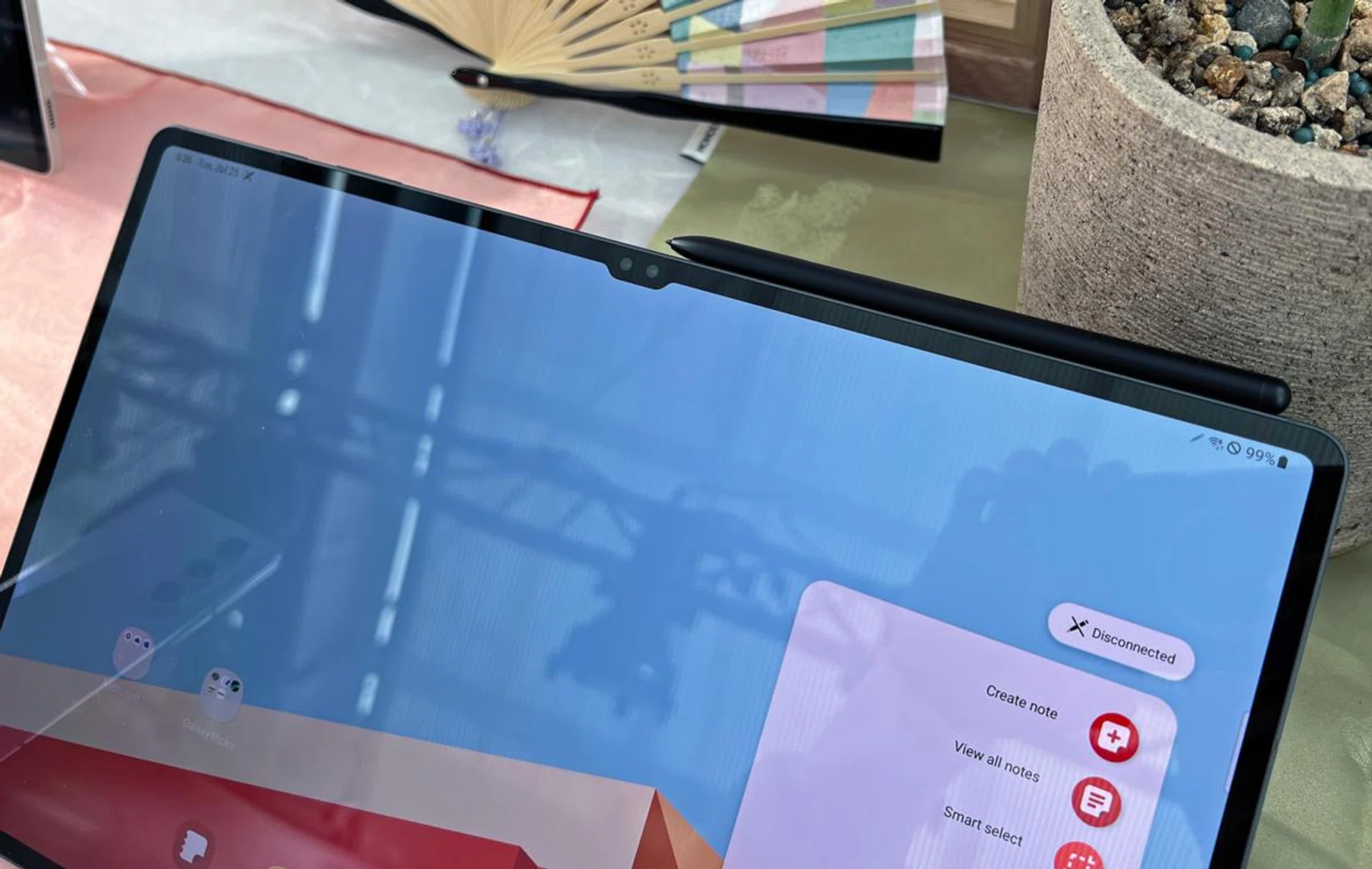 Normal operations for a Galaxy Tab S9 series tablet. the S Pen is mounted magnetically on the top rung.