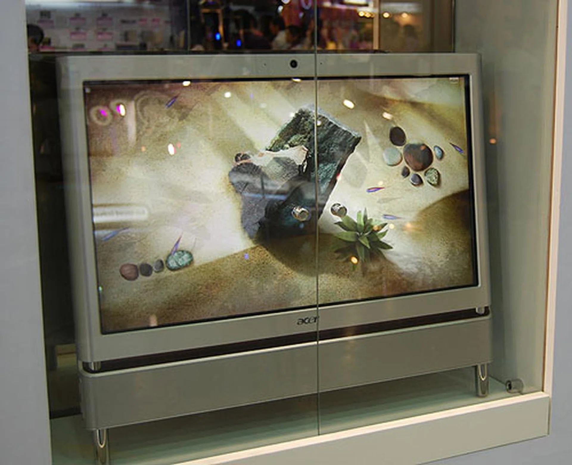 Like so many other vendors, Acer has prepped an All-in-one PC with touchscreen to take advantage of the upcoming Windows 7 support.