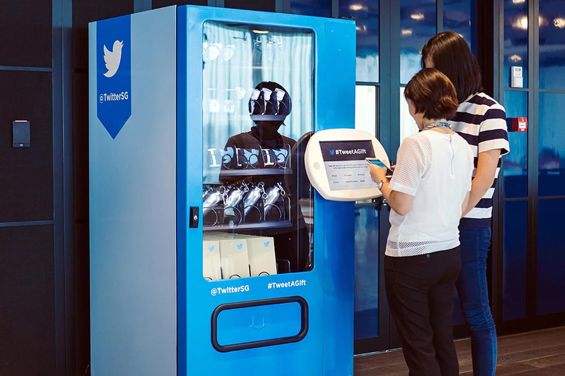 Send a tweet with the correct hashtag, and you'll get a little something from the vending machine. It operates on days where the office is holding an event.