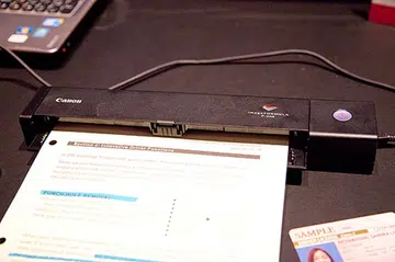 The new Canon imageFORMULA P-208 Scan-tini personal scanner.