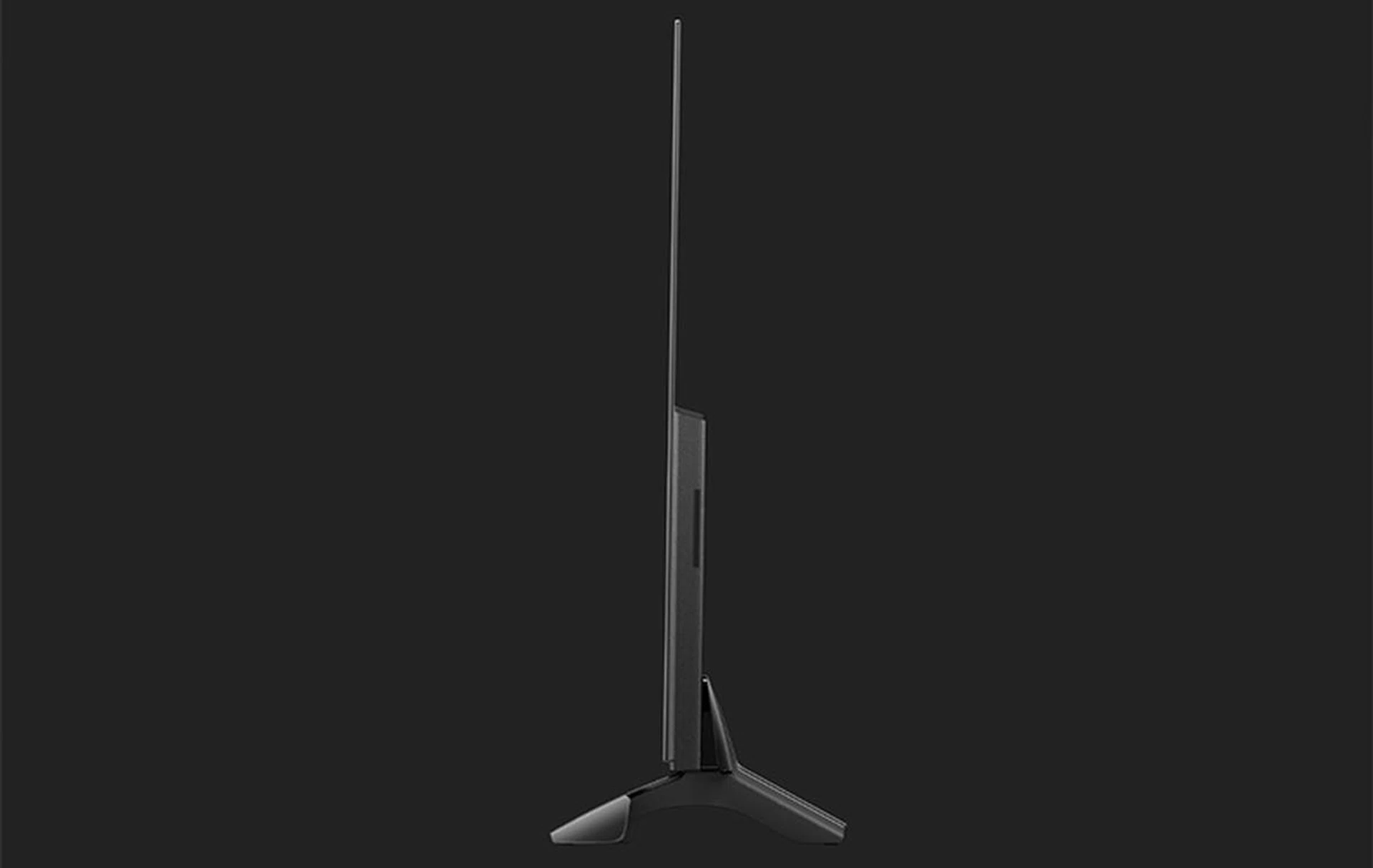 The top of the TV is very thin, because it's mostly the OLED panel. The bottom bulge is a result of the electronics and ports.