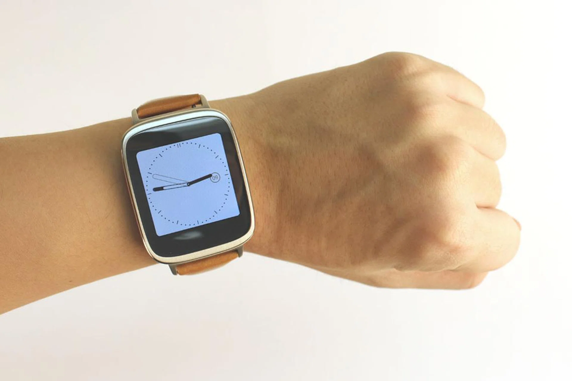 The ZenWatch has a square display, but the bezels around it are rounded, softening its appearance. 