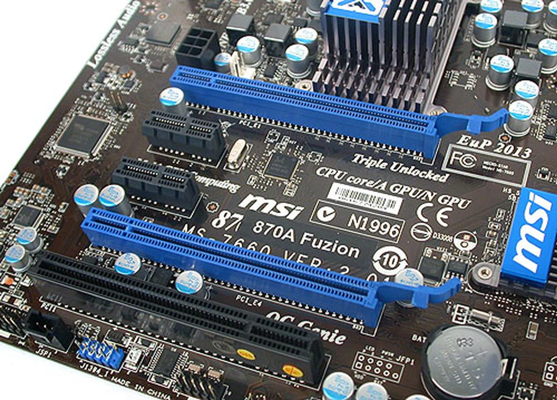 The two PCIe 2.0 x16 slots are in blue, with two PCIe x1 sandwiched in between so that one can install dual-slot graphics cards. There's also a single PCI slot that will be rendered useless if you do install such large graphics cards. A 6-pin power connector allows you to provide extra juice to power-hungry graphics cards, though we feel it's unlikely. 