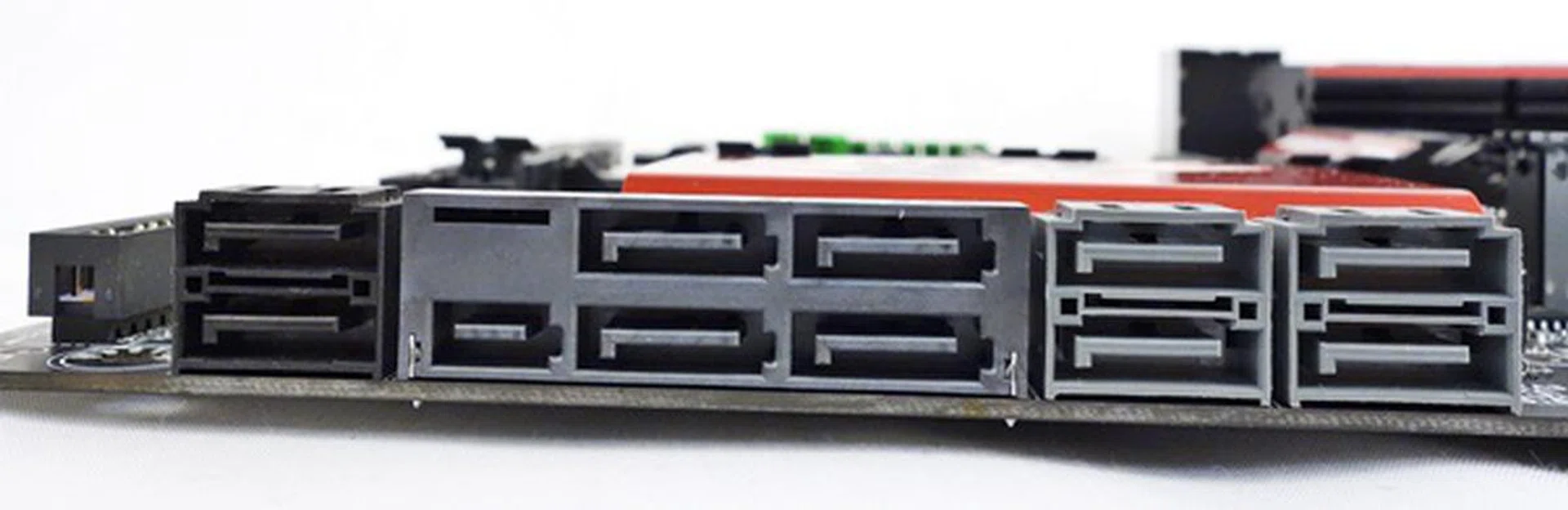 To the far right, the stack of four SATA connectors (light grey) are linked to the Marvell SATA controllers. The rest of the SATA ports (and SATA Express) are courtesy of the board's Intel Z97 Platform Controller HUB (PCH).