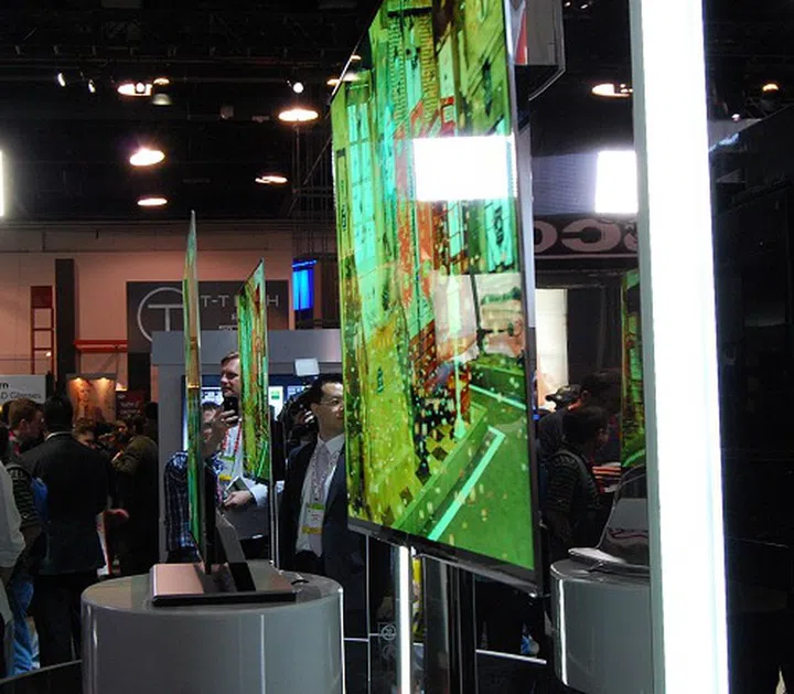 Check out the slimness of the OLED TV! From this distance, they seem to be thin enough to slice bread.