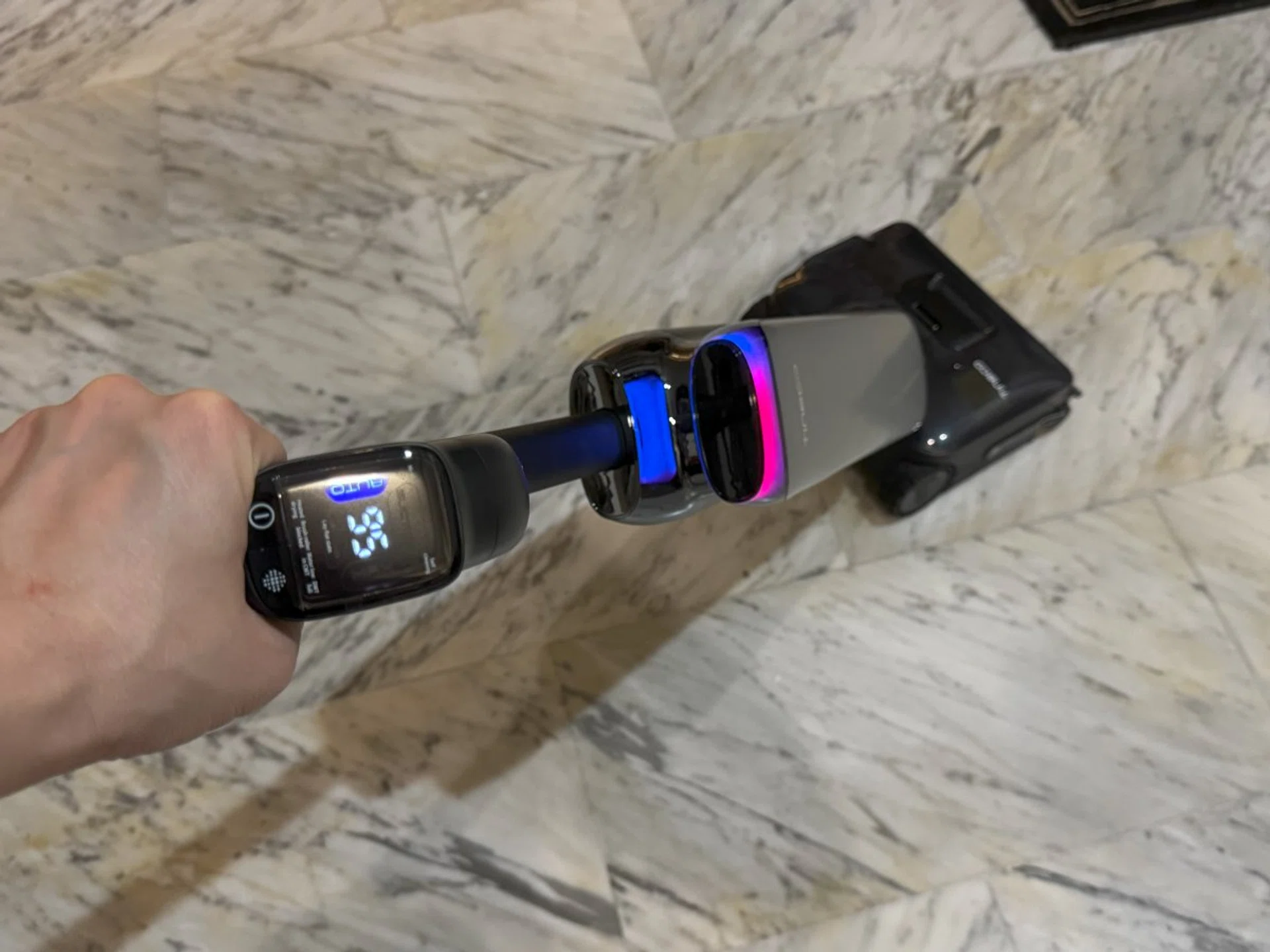 The handle can swivel and tilt, easing strain on your wrist as you maneuver the vacuum. Photo: HWZ