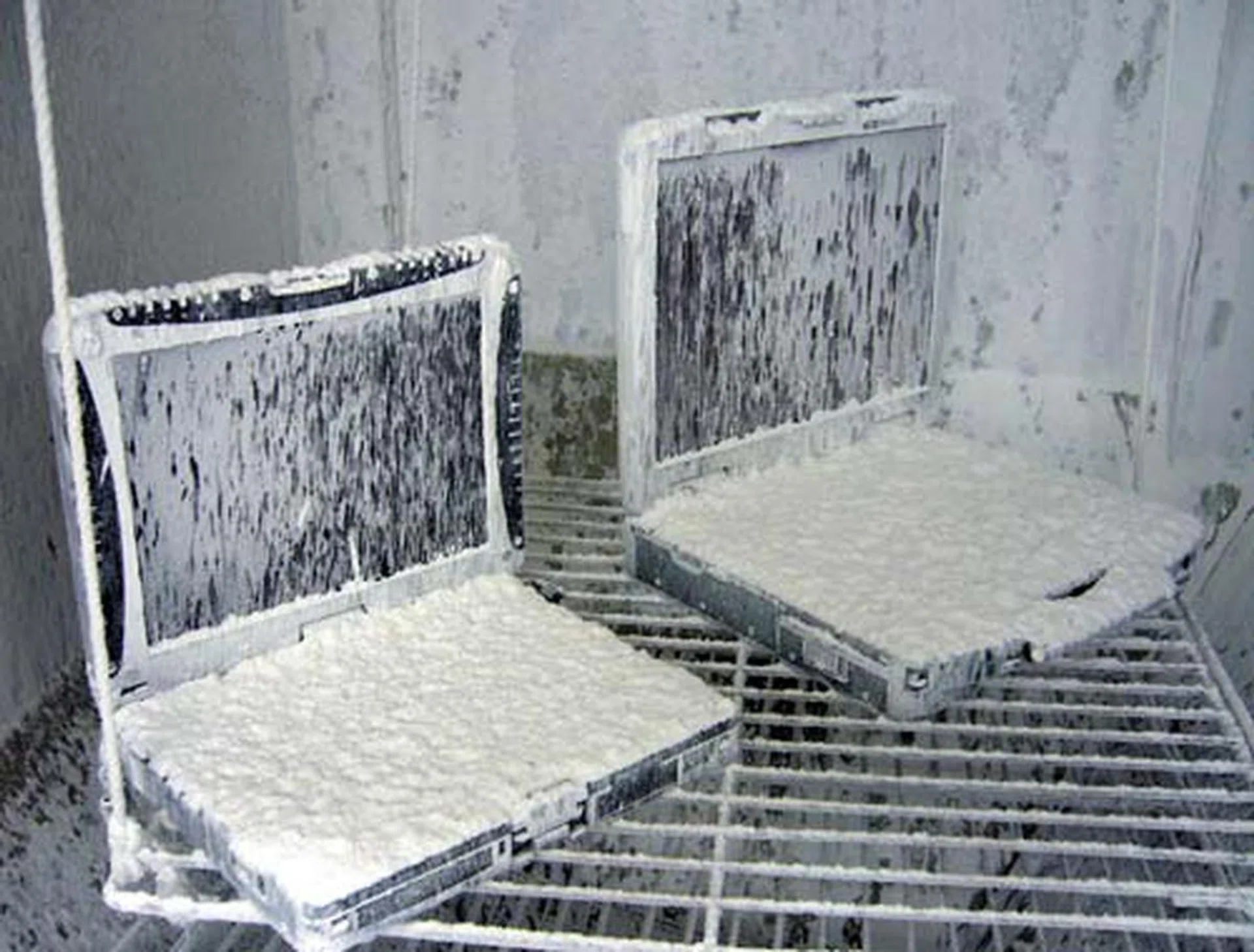 Though the picture looks like there's ice on the notebooks, this enclosed test space is for dust testing. The notebooks looked really, really icky.