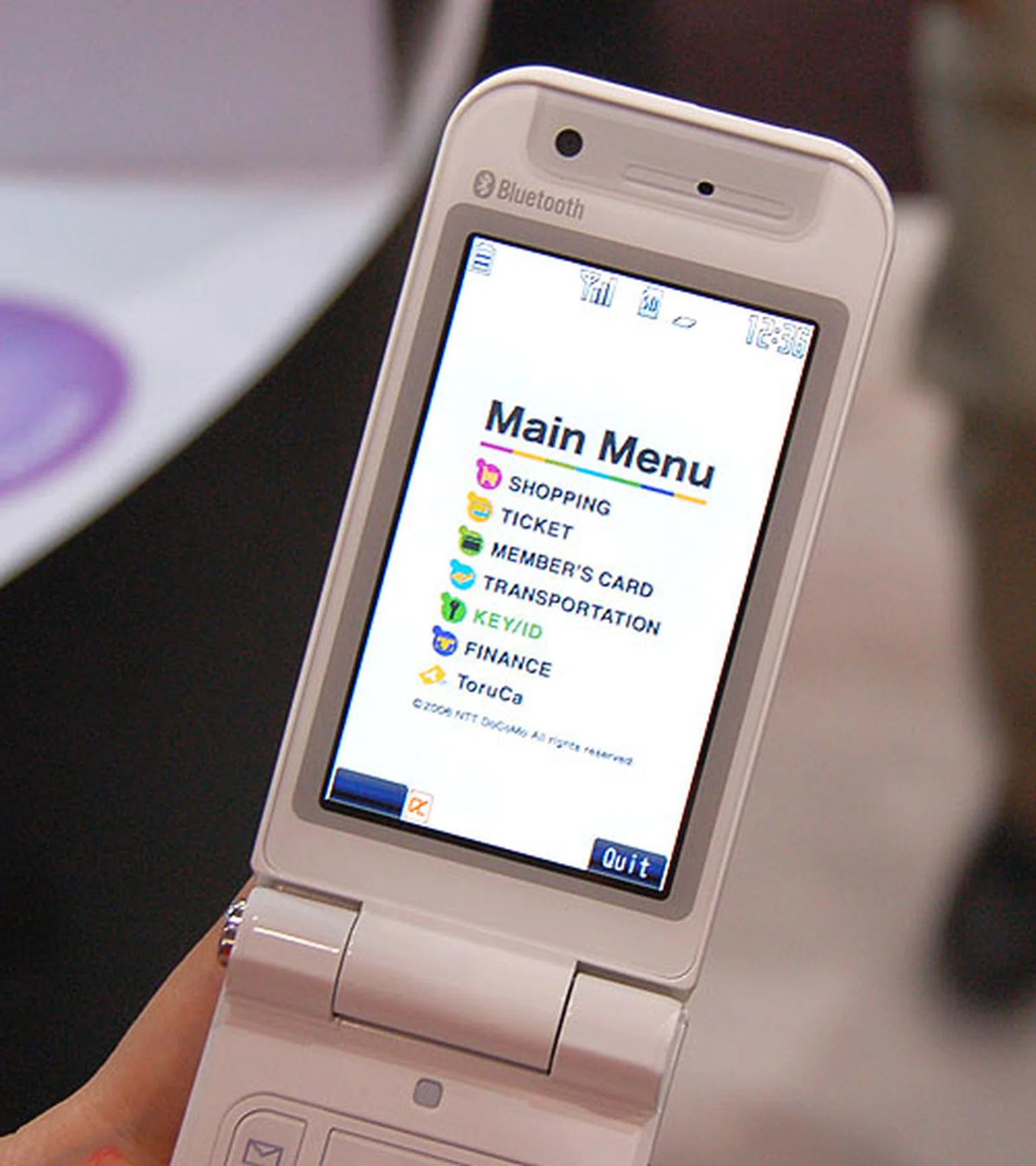  A hint of what you can expect from i-mode FeliCa, a contactless smart card system integrated into the phone mobile, which expands the purpose of mobile phones into being a full-fledged e-wallet equivalent device. Users can ditch their wallets and use only their phones for various purposes like shopping, paying bills and even for discounts during shopping.  