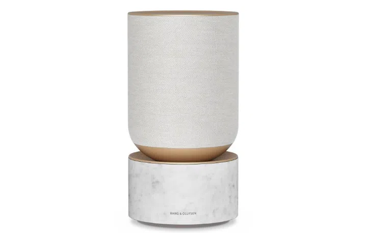 The Beosound Balance in gold has a Carrara marble base. (Image source: Bang & Olufsen)