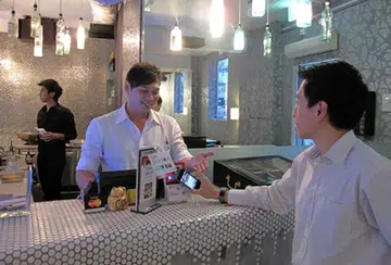 Using your mobile phone to make a payment for the meal you just had? It is possible through NFC.