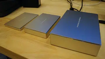 LaCie's Porsche Design Mobile Drives (left and center), and the LaCie Porsche Design Desktop Drive (right).