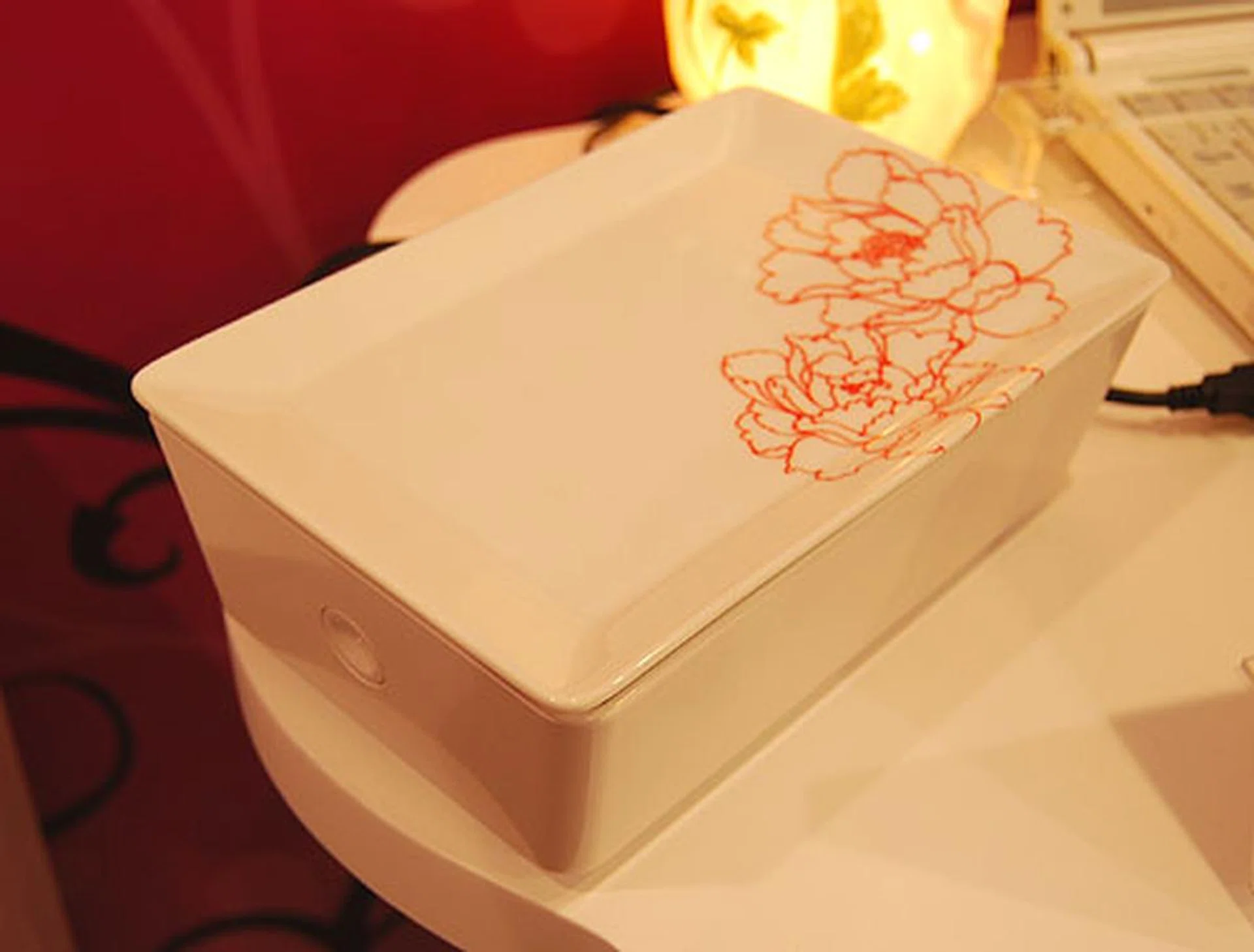  An external hard drive enclosure like no other. It's made of plastic with a porcelain top. It comes with USB 2.0 and eSATA interfaces. Let's just say it's another reason to take care of your external hard drives.  