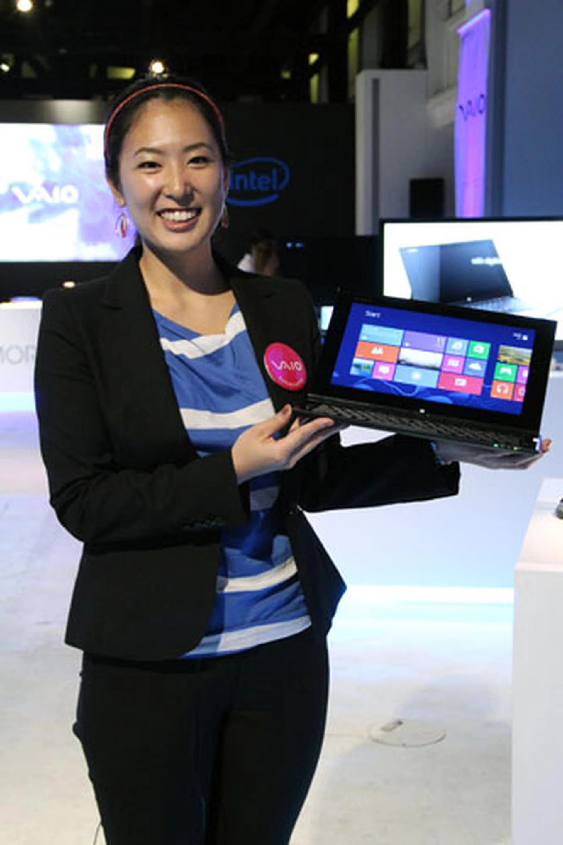 Sony UX Communications Product Manager, Ayumi Hashimoto, showing off the Vaio Duo 11.