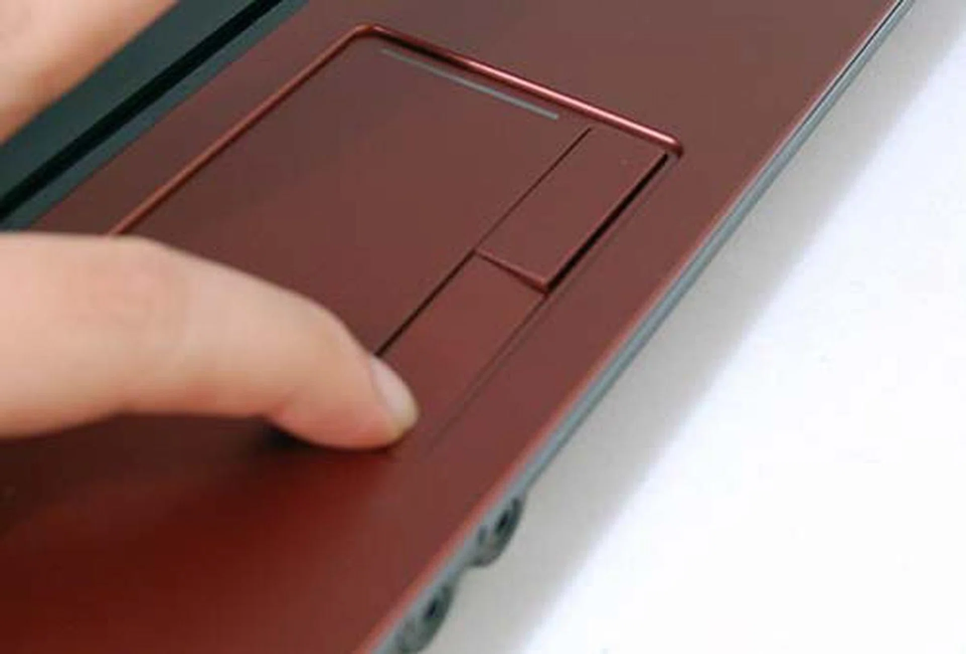 The trackpad buttons' odd angle when depressed made us miss the normal trackpad buttons found on other notebooks.