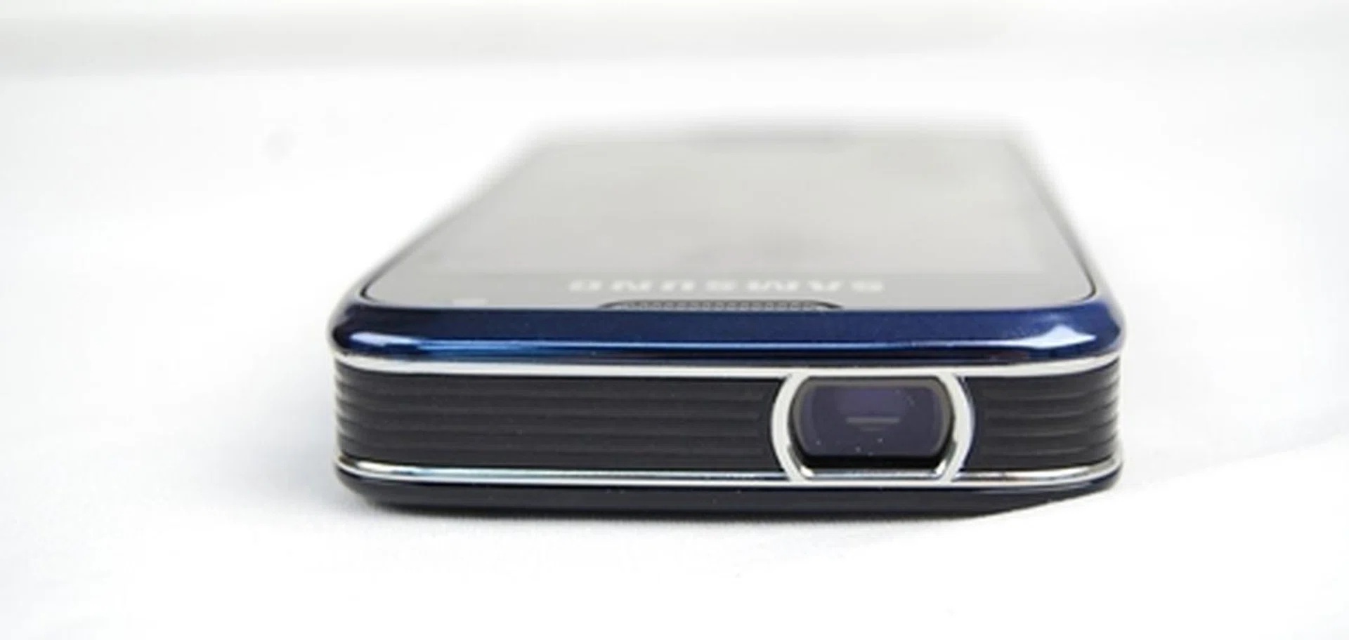 And here's the main attraction - the built-in projector takes almost half of the top side of the smartphone.