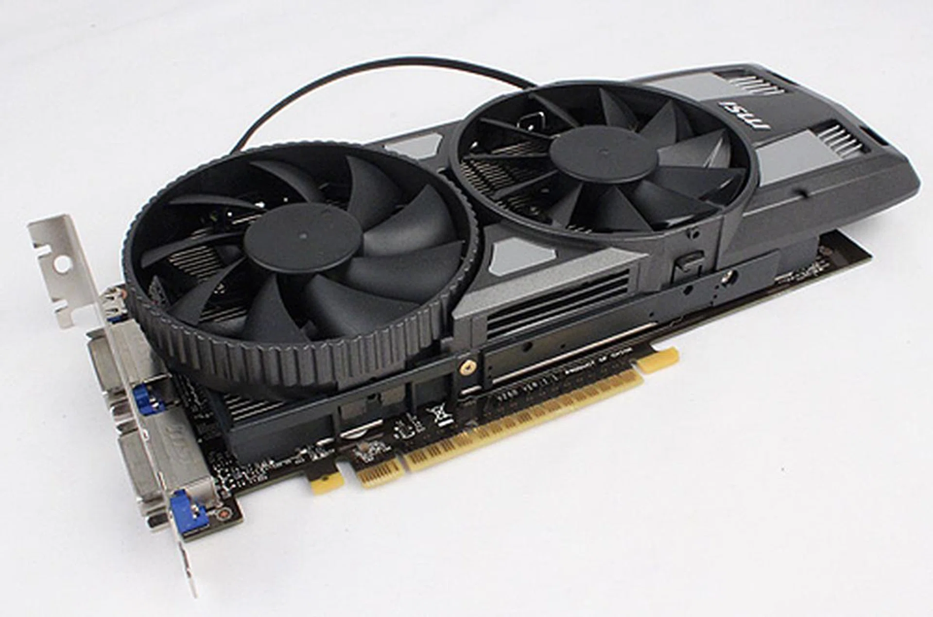 Slide the entire custom cooler to the side and install the additional fan such that they are side by side, as shown.