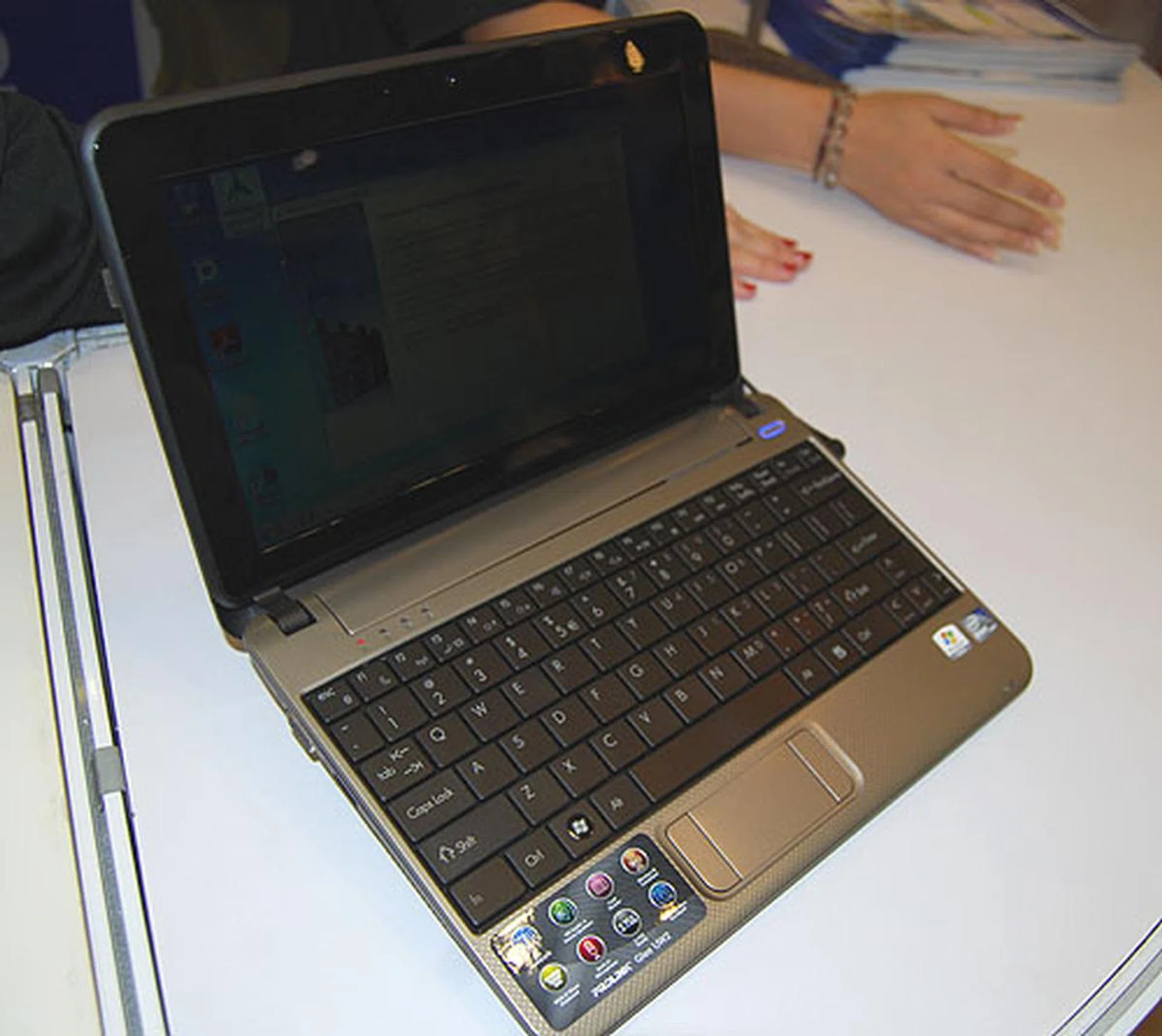 If you just can't do without a keyboard, the Glee Netbook UW2 will be a suitable replacement. Again, Intel Atom based, but you get only Win 7 Starter, though it's much more affordable at $399. 
