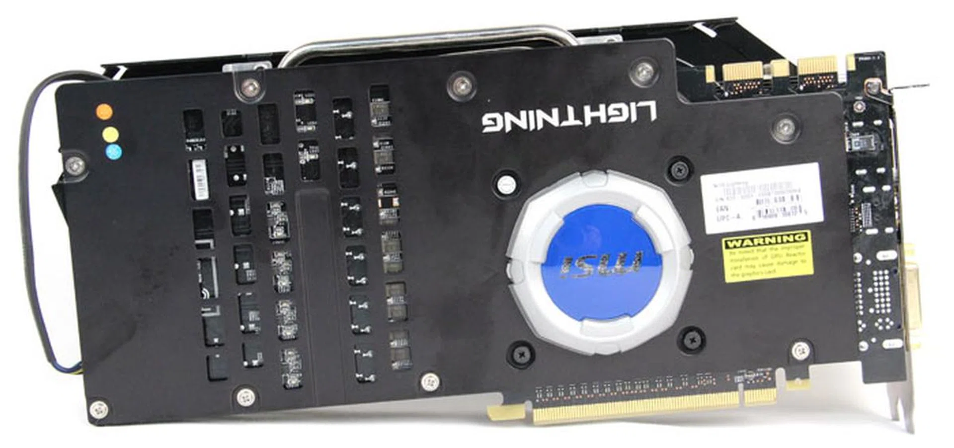 The custom PCB is protected by a backplate. The card is also equipped with MSI's GPU Reactor, an add-on PCB that holds a battery of tantalum capacitors, which further conditions power for the GPU. On the downside, the GPU reactor sticks out quite a lot, which could cause issues with SLI spacing.