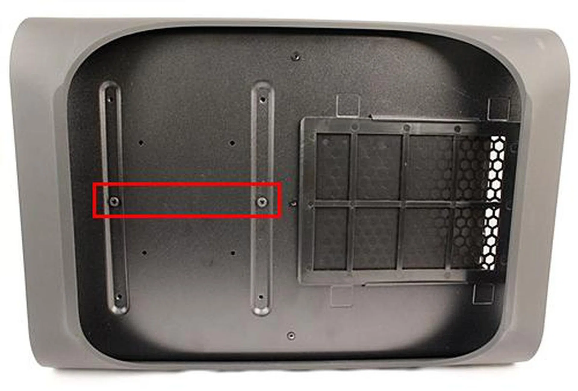 The pair of M3 screws that secure the bottom 3.5-inch drive bays in place.
