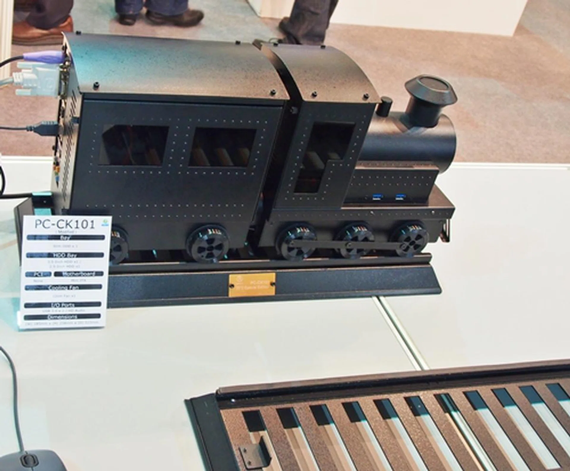 The PC-CK101 fits a mini-ITX board and supports a single slim ODD. It features one 3.5-inch HDD bay slot and another that measures 2.5-inch. It has two USB 3.0 ports and supports a single 12cm cooling fan.