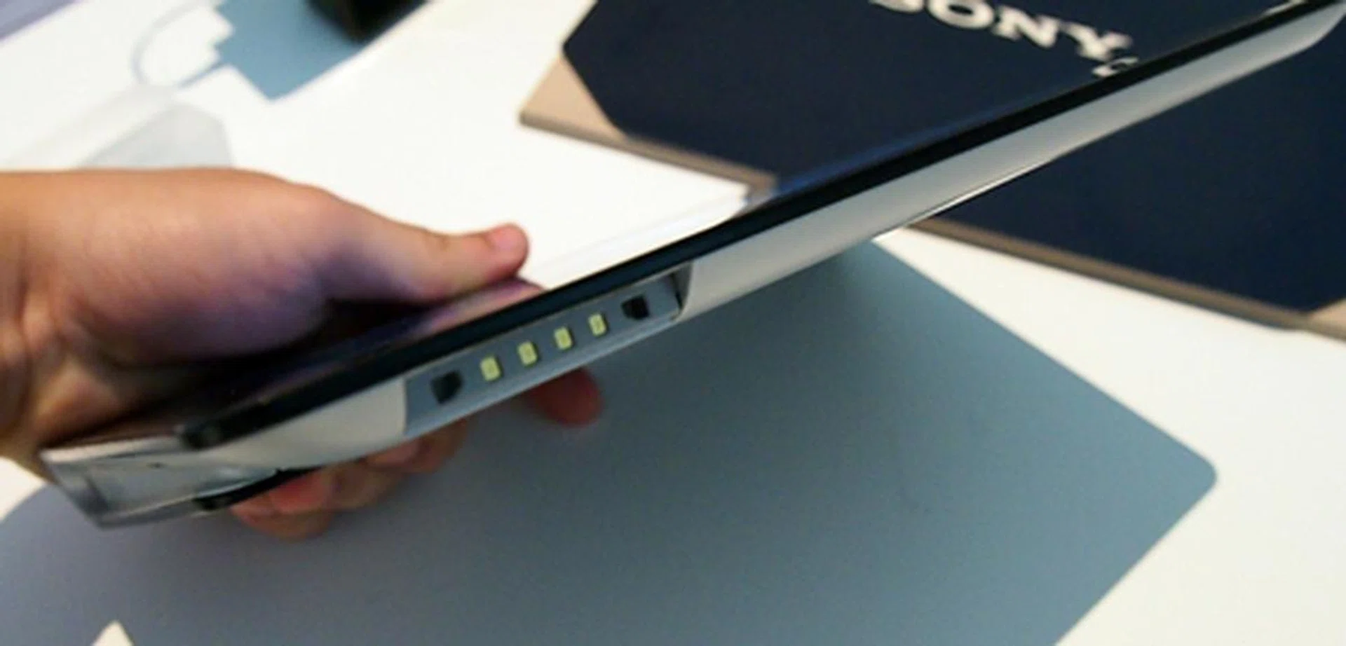 You can find the power jack at the bottom left side of the Sony Tablet S. 
