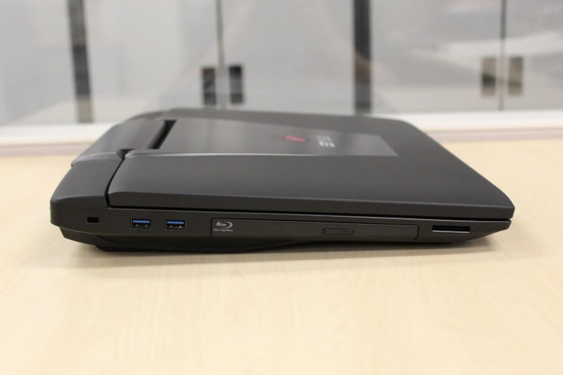 From left to right: two USB 3.0 ports, the BD-RW drive (a rarity these days) and a card reader.