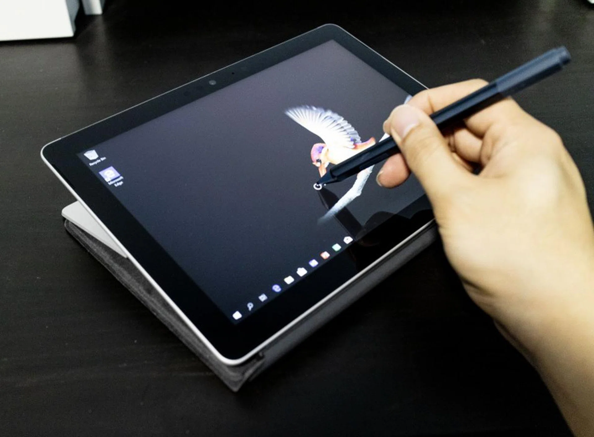 With the kickstand completely laid back, aka Studio Mode, it makes it easy for inking activities such as taking notes or drawing/coloring. Of course you need to purchase the optional Surface Pen to enjoy these extra capabilities.
