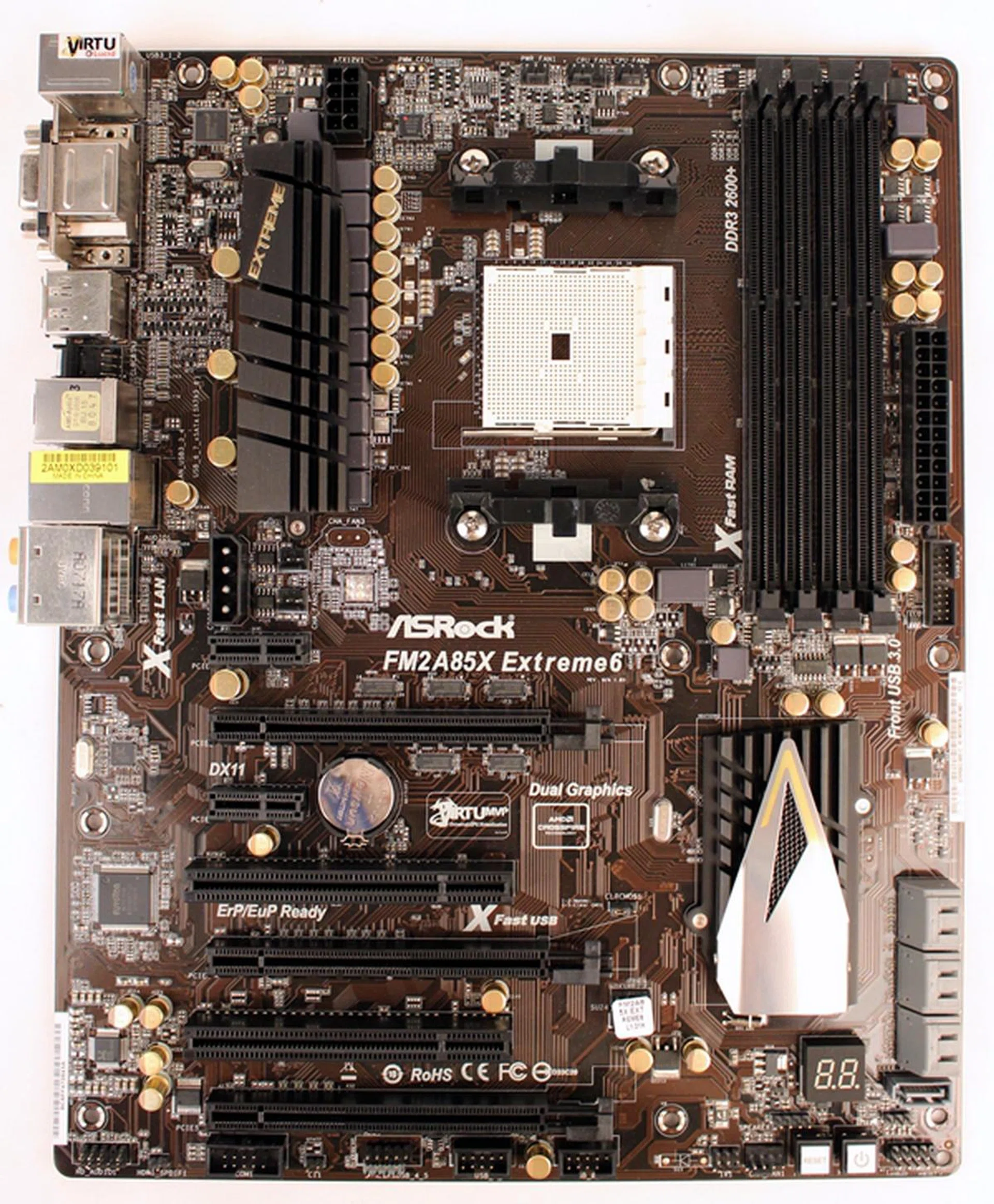 The ASRock FM2A85X Extreme6 is one of the two ATX boards in our lineup. It sports large gray heatsinks and gilded capacitors that are touted to have higher durability coupled with better performance in power regulation.