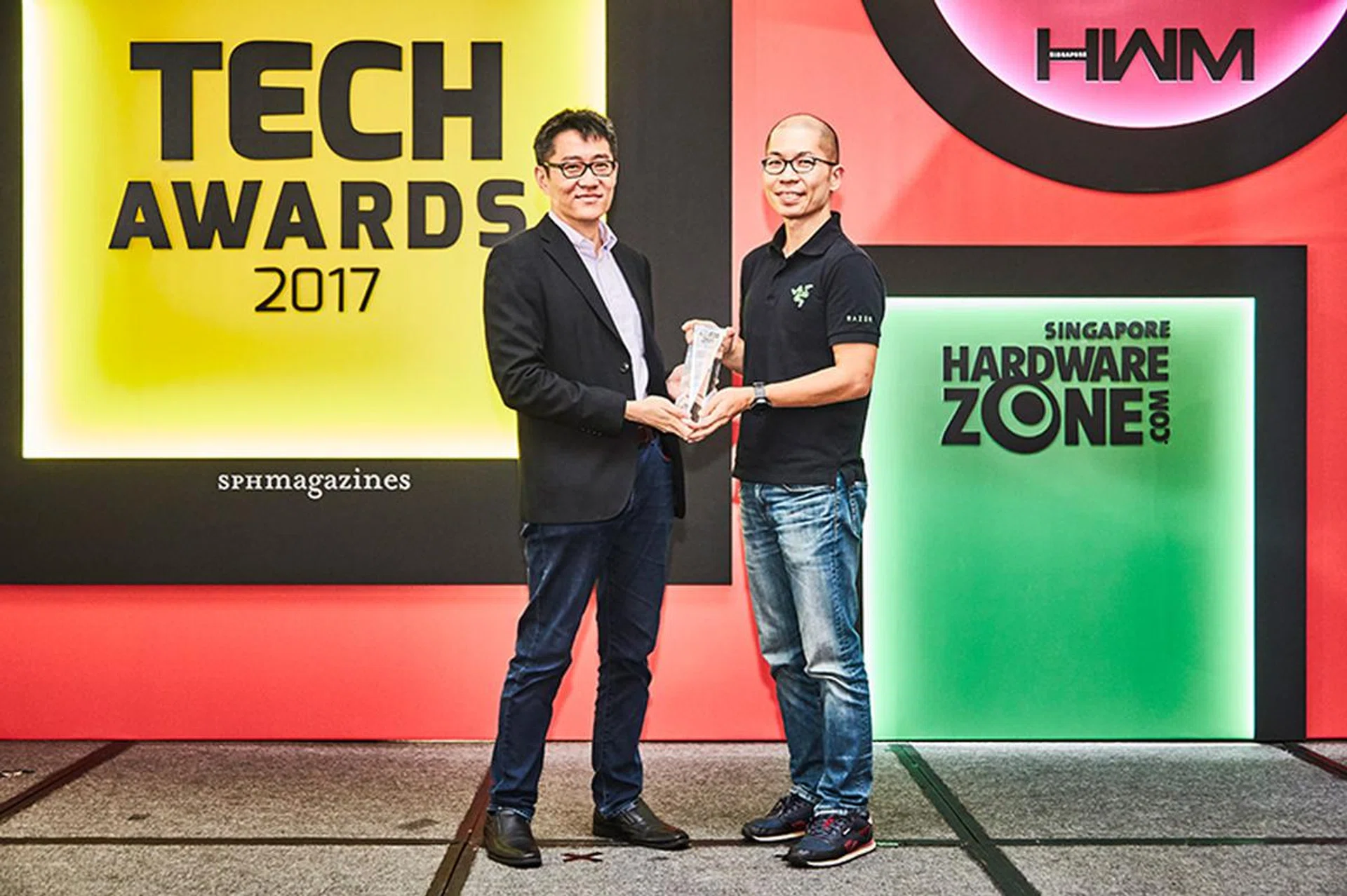 Our readers' said their favorite gaming keyboard and mouse maker is Razer. Accepting the award here is Mr. Ian Tan, Global Marketing Director at Razer Inc.