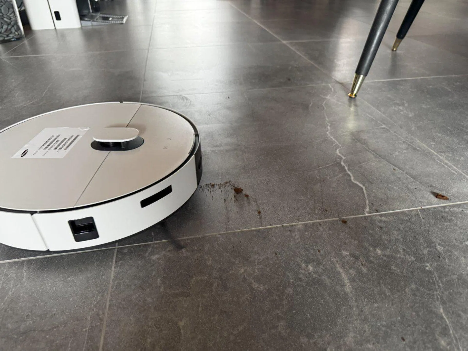 Spot cleaning spilled coffee grounds. Photo: HWZ