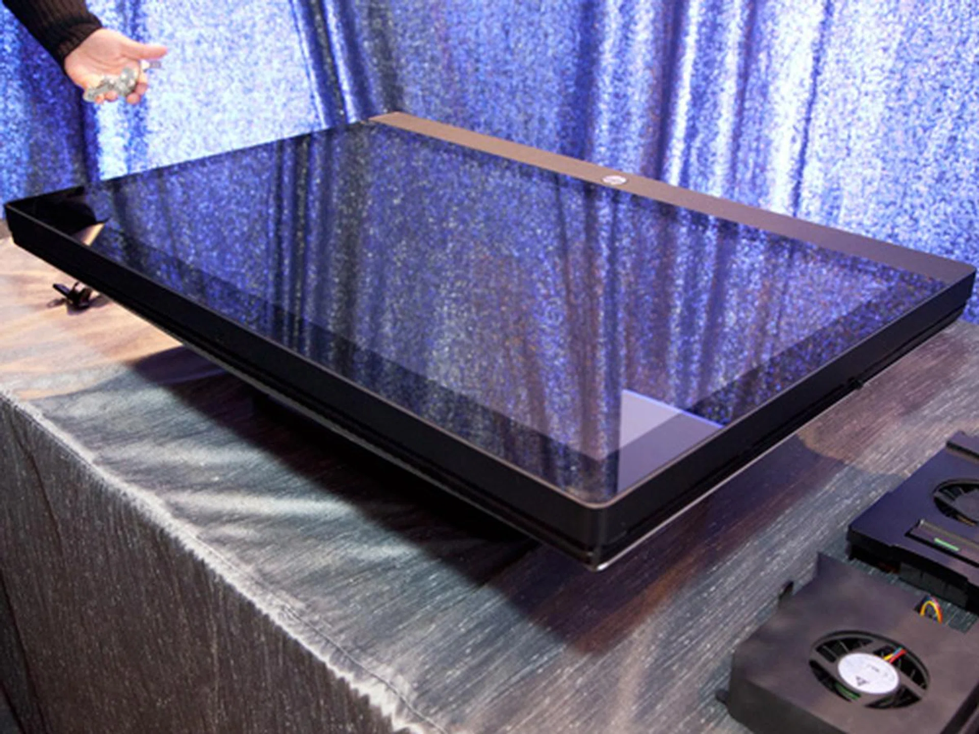 Pushing the screen down into this horizontal position puts it in the service mode. And no, you don't put the screen into this position for Angry Birds.