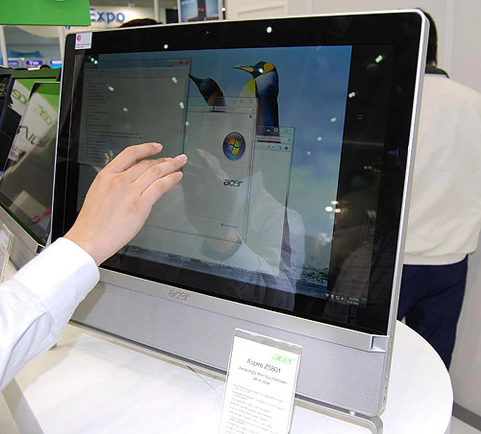 A Sandy Bridge powered AIO, the Acer Aspire Z5801 is a 24-inch model with optical multi-touch and will have an NVIDIA discrete graphics card inside. A Blu-ray disc burner and USB 3.0 ports make it a modern desktop system. 