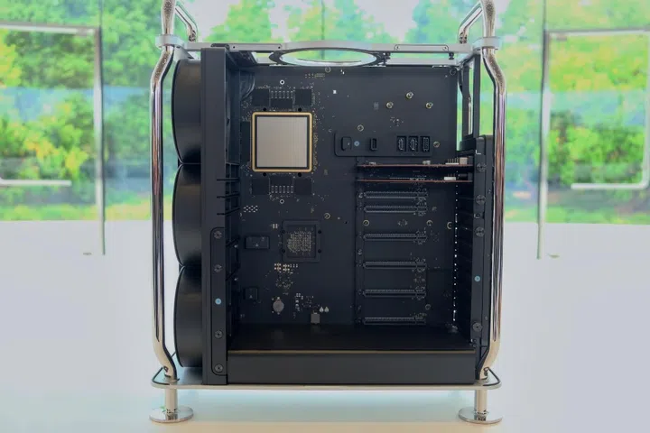 The M2 Ultra chip in the top left is massive. Note also the PCIe expansion slots at the bottom right.