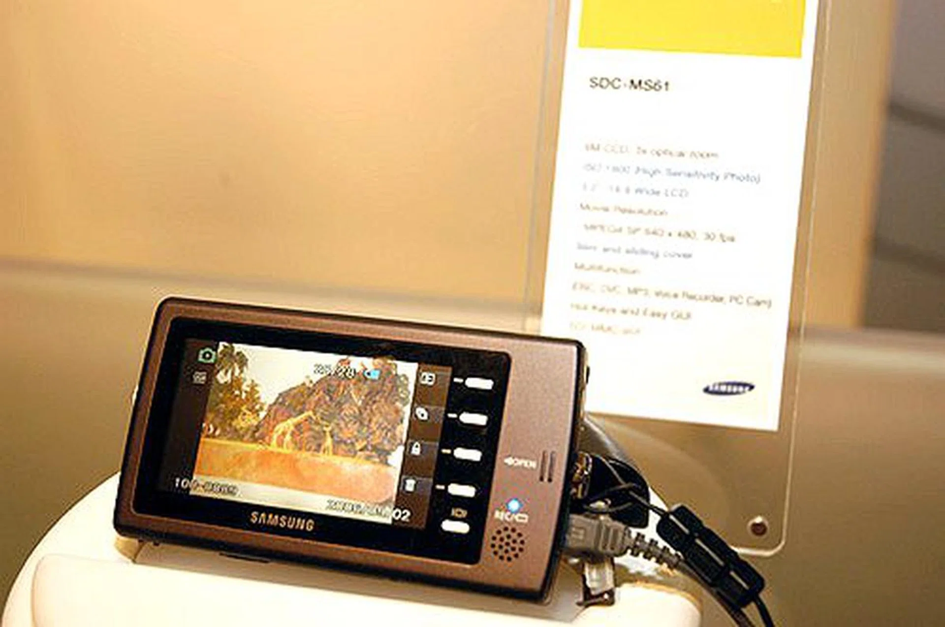 The Samsung SDC-MS61 was mentioned in our previous article on IFA 2006. It's a testimony to Samsung's aim to create the ultimate convergent device - this device not only takes photos at 16:9 6-megapixel resolution but supports MPEG4 SP-recording capabilities. Featuring ISO 1600, with a big 3-inch wide LCD screen, it has a 3x optical/5x digital zoom and web camera functions. A camcorder, video recorder, web camera, MP3 player and so much more, the MS61 supports SD and MMC cards.