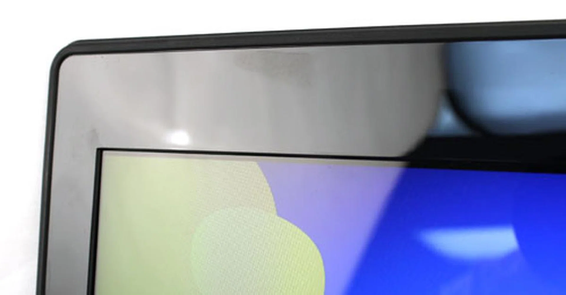 The screen bezel and keyboard well are both glossy black plastic.