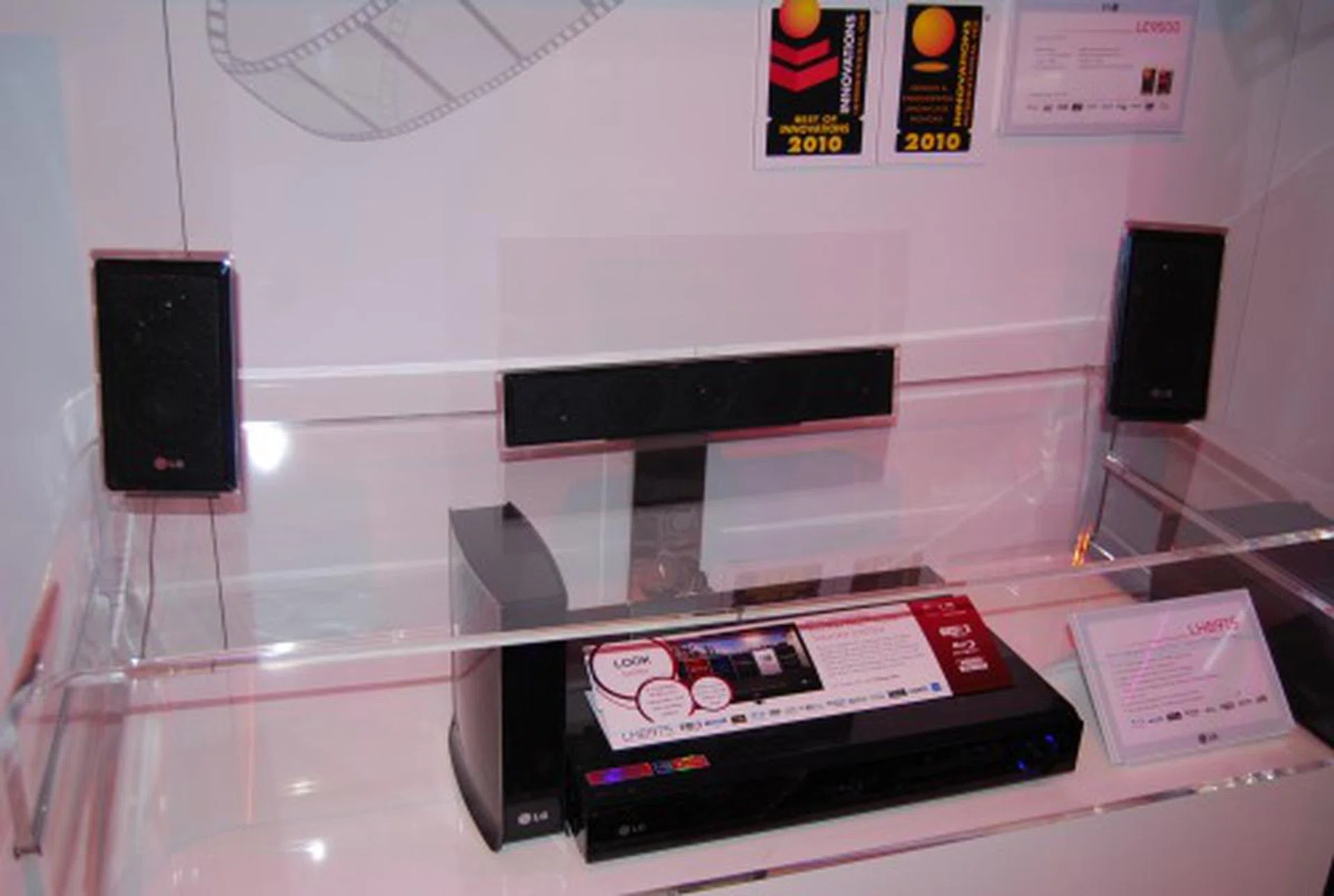 The LHB975 shown here is a WiFi network Blu-ray home theatre system. A tri-channel wireless system talks to the various sub-components of the system such as the speakers, AV receiver and subwoofer. The receiver is also endowed with WiFi connection and supports NetCast Entertainment Access for a wide variety of online content for viewing. So if your TV doesn't support NetCast, just upgrade your home theatre system.