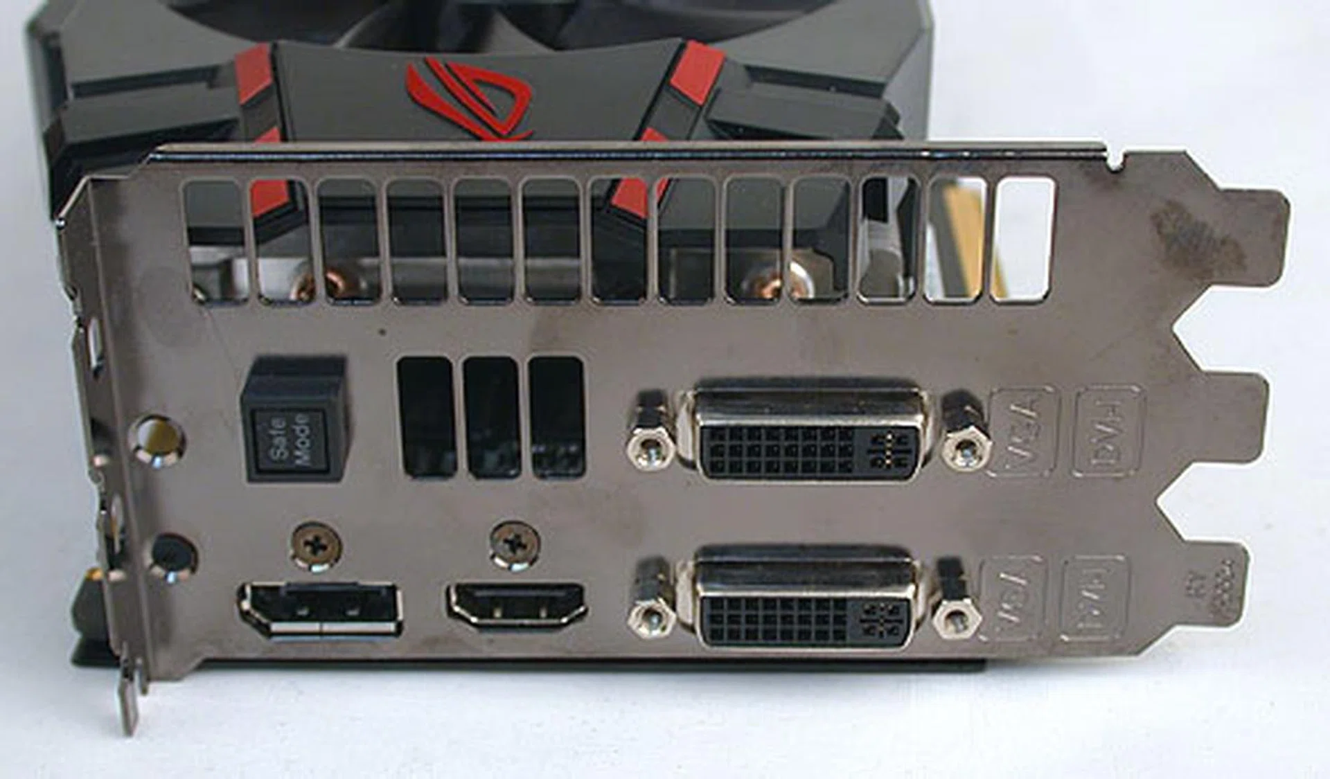 There are four display outputs on this GTX 580. Two dual-link DVI ports, a DisplayPort (not mini-DisplayPort like other NVIDIA cards) and an HDMI port. There's also the special Safe Mode button that will restore the BIOS to the default settings, giving enthusiasts the peace of mind to overclock. Despite the number of ports, like the standard GTX 580, this graphics card only supports dual monitors.
