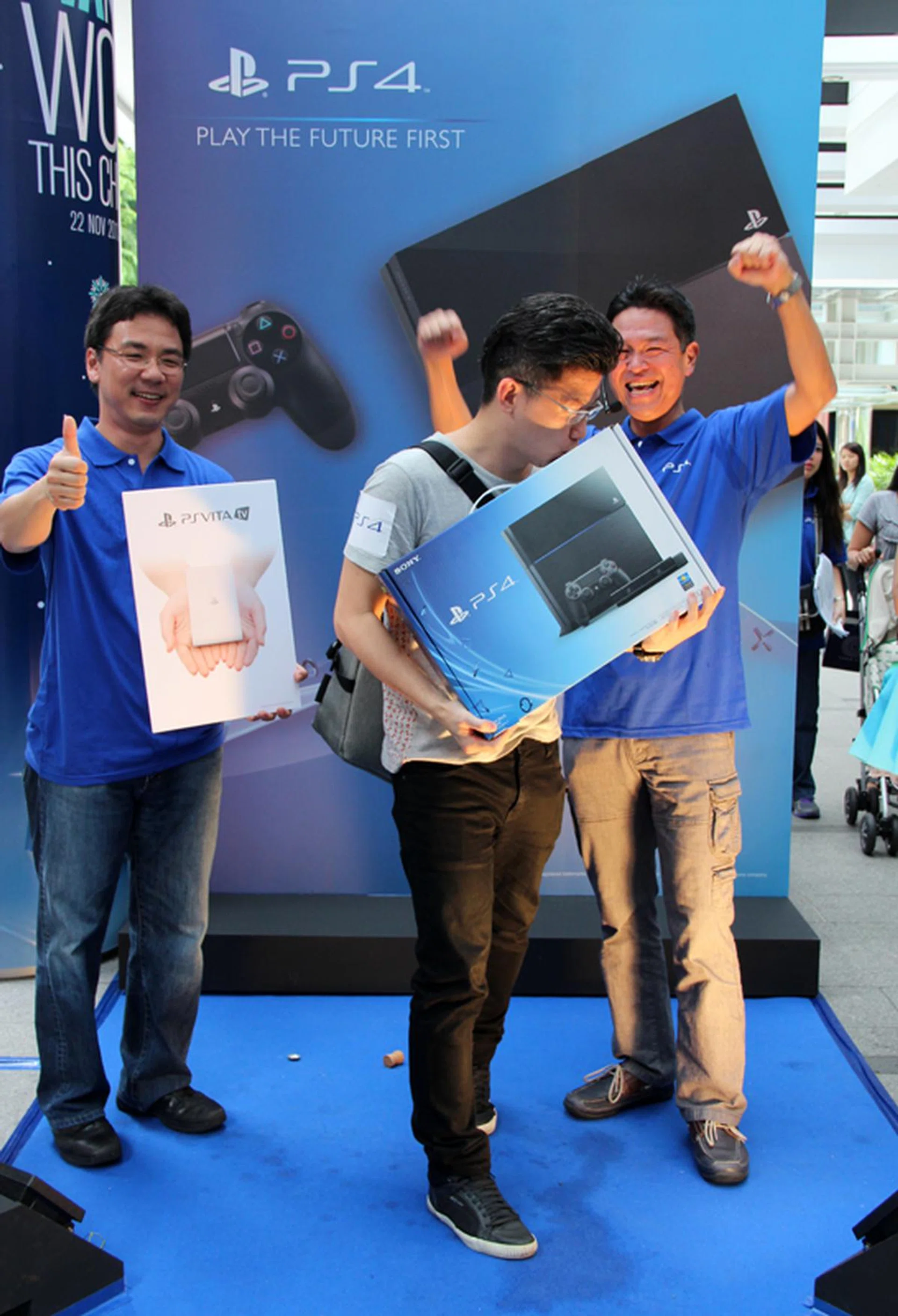 Mr. Aaron Tan was the first person in line to collect his PS4 pre-order today. 