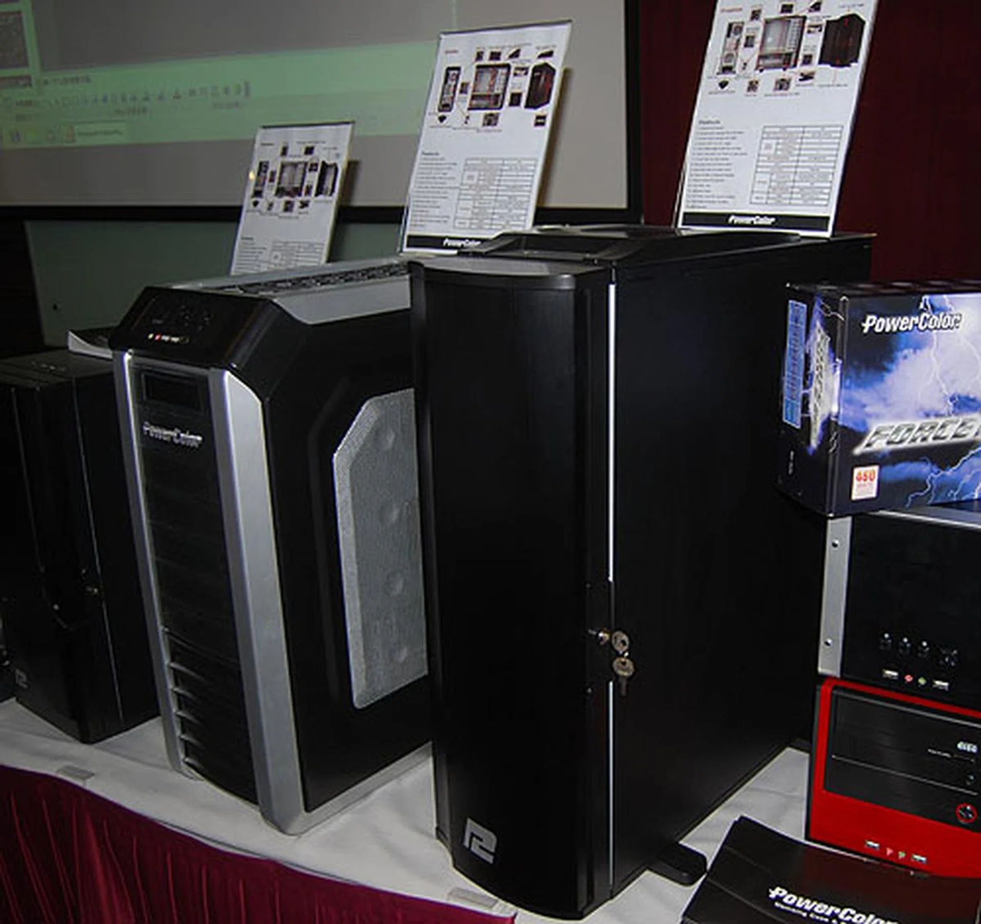  It's a lull period for graphics and most of the graphics cards on display were not exactly new. What surprised us was that PowerColor actually has dabbled in doing chassis and some of these models were on show. The tall black full tower here (known as Eruption) sports a solid aluminum door though its internal uses SECC steel. It uses a tool-free design for its drive bays.  