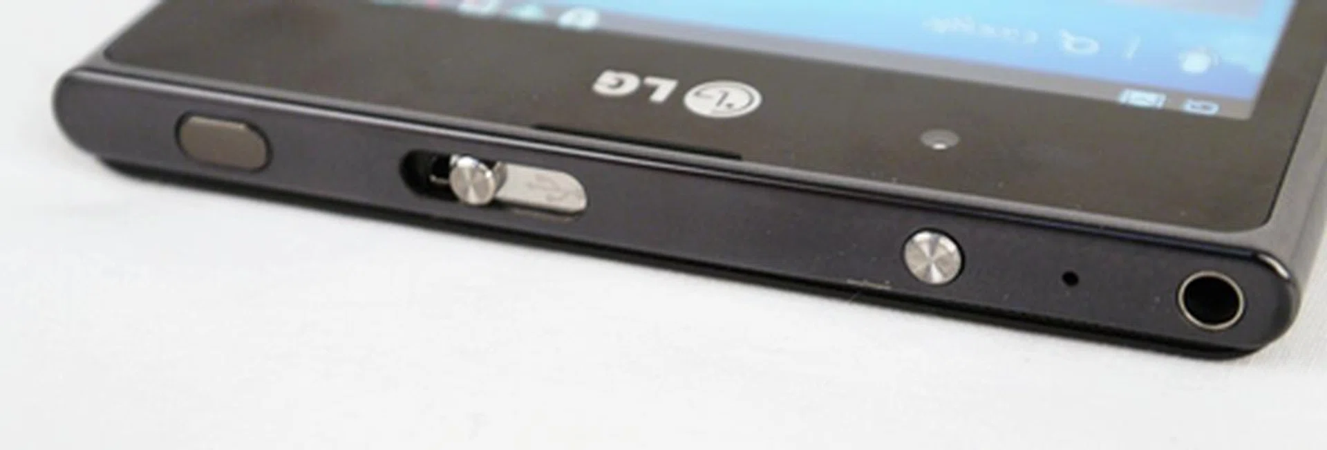 Like its LG Optimus 4X HD and Prada by LG 3.0 peers, the Optimus Vu is framed by silver-accented buttons. From right to left - power/lock button, a micro-USB port that's protected by a silver slide-out cover and a built-in QuickClip button. The latter allows users to make notes, draw and edit on virtually any screen/photo/documents (including any home screens) in one quick touch - one that's similar to Samsung's S Memo function.