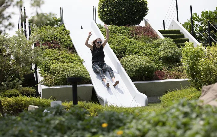 The garden has a slide for adults? Credit: Google.
