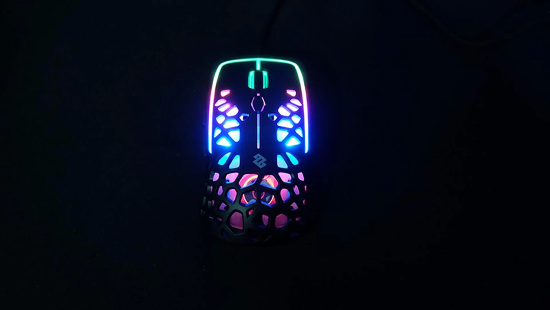 The shell of the mouse is perforated to reduce weight.