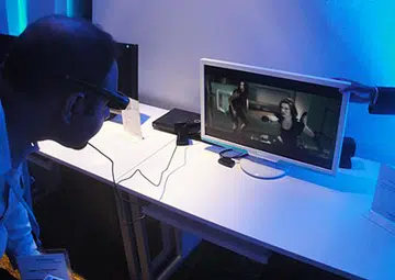 Testing out the G-Line prototype model revealed to journalists in August 2011 which was a 27-inch 3D monitor that worked with active shutter technology. (Source: hardwarezone.com.sg)