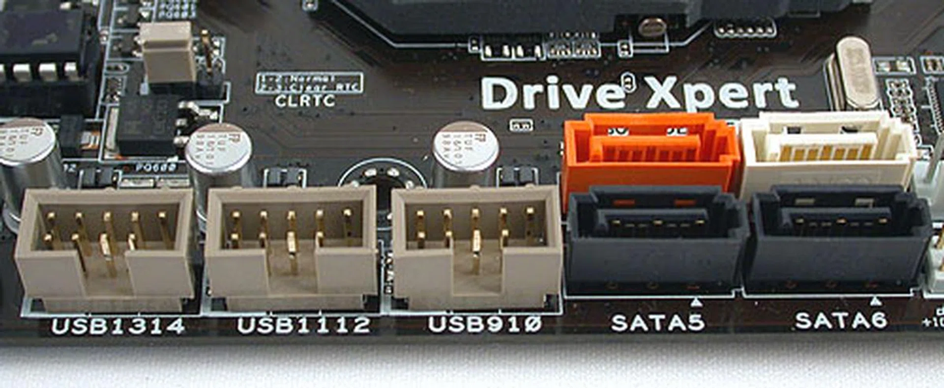 The other two remaining SATA ports from the Intel P55 chipset (in black). Lastly, the two other colored SATA connectors are from the JMicron controller and support ASUS' Drive Xpert feature, one that allows for easy RAID setups.