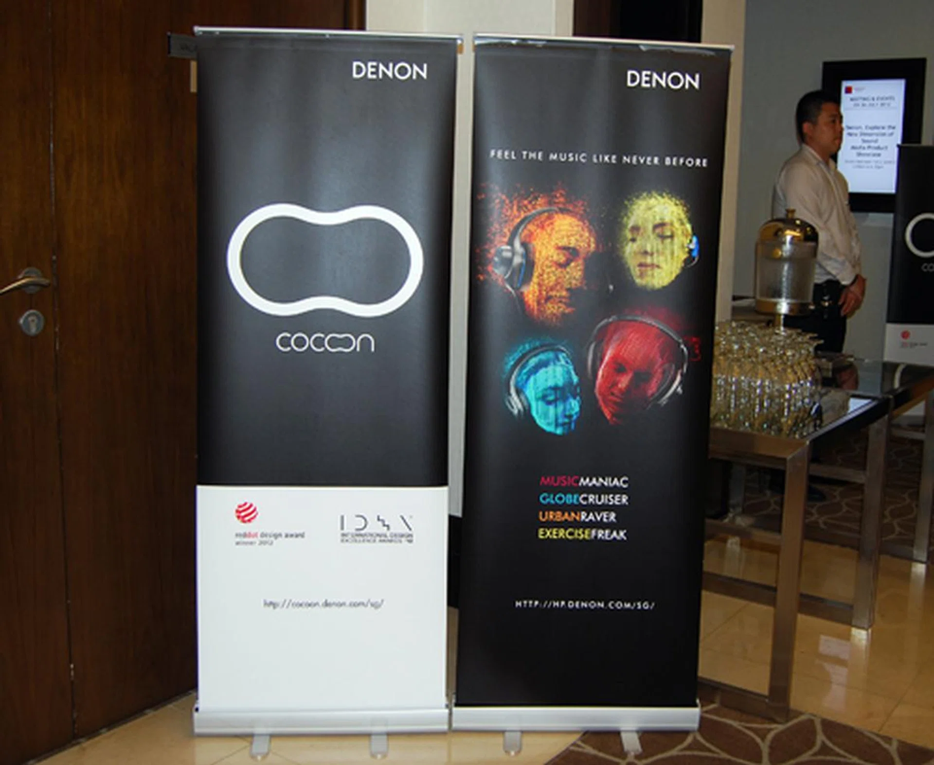 As proclaimed by the banners at the door, Denon is going mainstream with the introduction of docking speakers as well as end-user headphones.