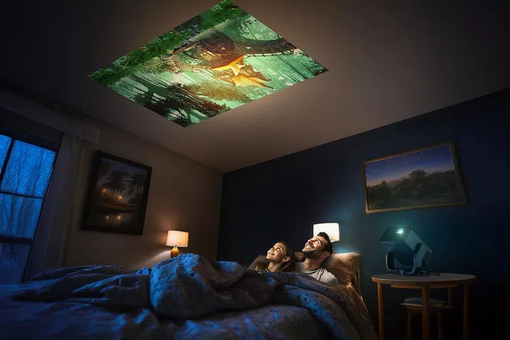 Transform your bedroom into a personal theatre by projecting stunning visuals onto your ceiling for a magical movie experience from the comfort of your bed. Photo: Epson