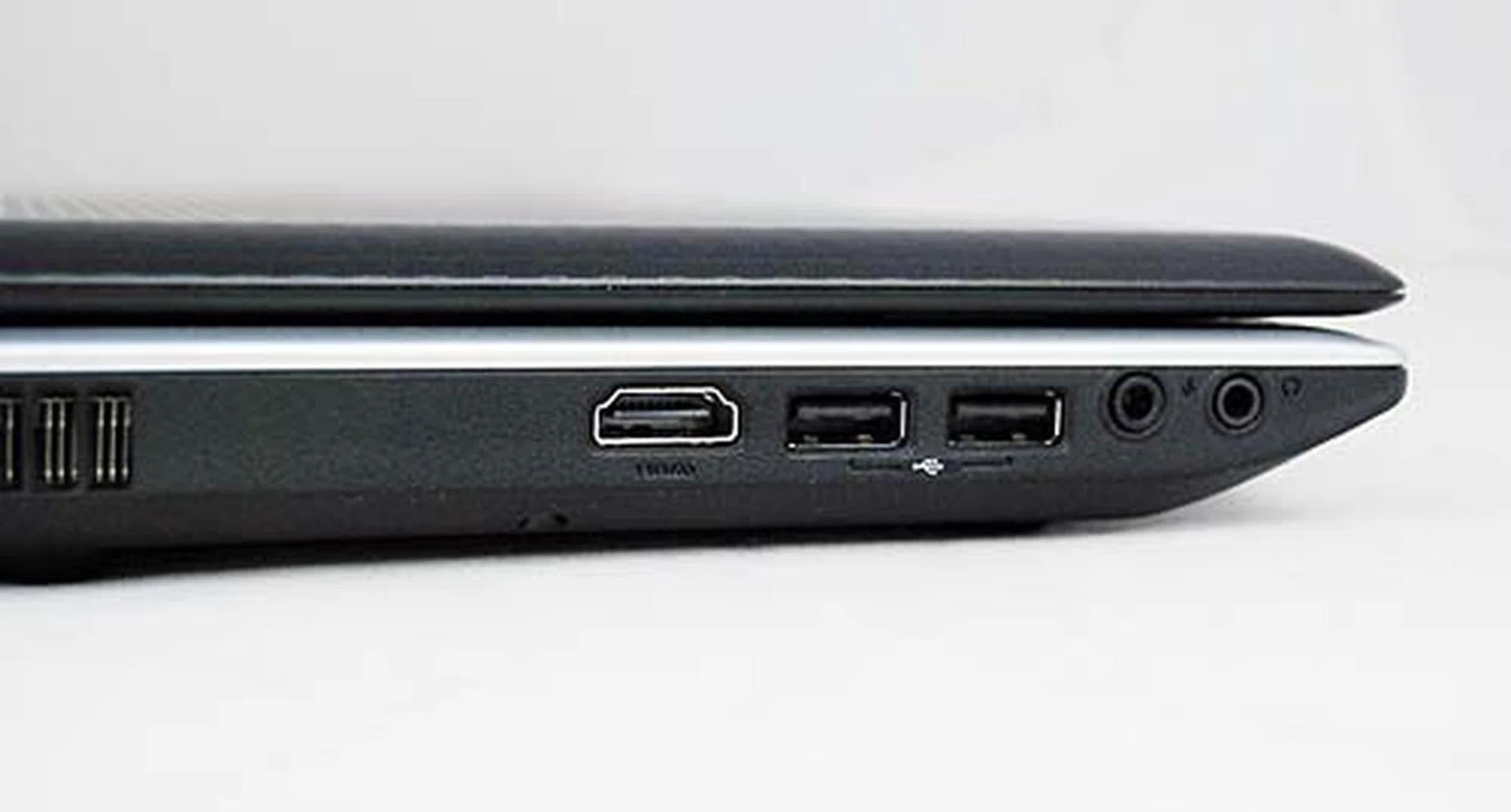 The majority of the ports are located on the left side and include HDMI, dual USB 2.0 ports and the audio jacks.