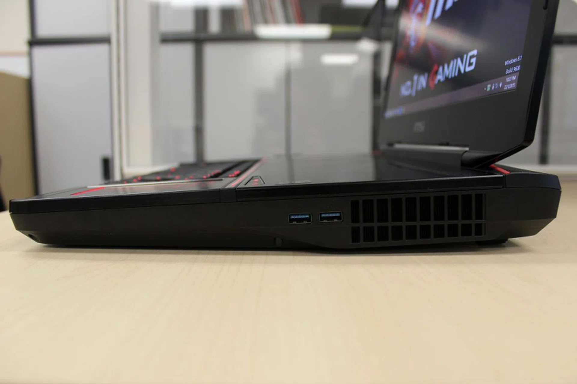 The right side is pretty bare, with only two USB 3.0 ports and huge vents to cool the machine.